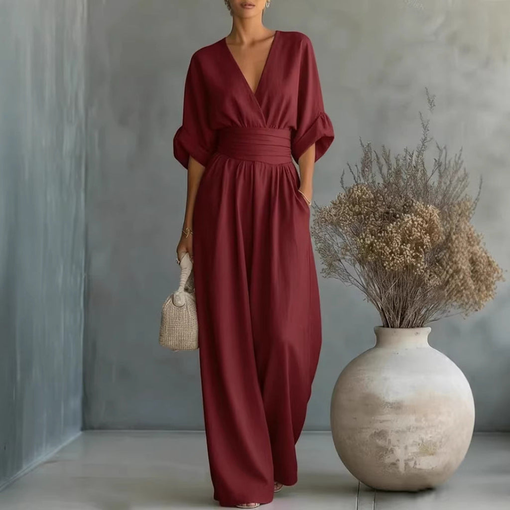 Jumpsuit Damen schwarz figurbetont mit V-Ausschnitt und Puffärmeln - 1 - Atelier-Zofia