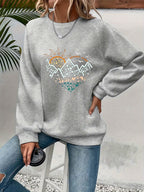 Sweater Damen schwarz weit mit Herz-Motiv und Rundhalsausschnitt - 2 - Atelier-Zofia
