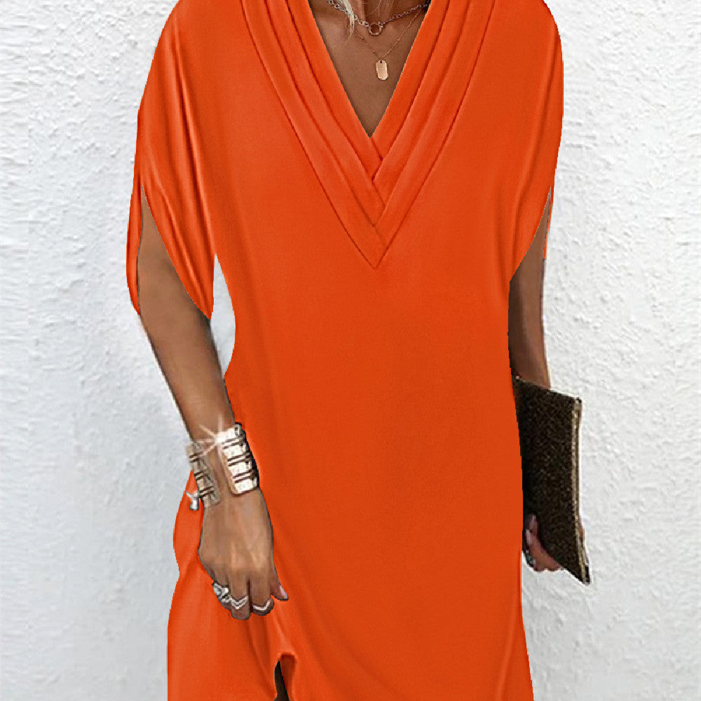 María – Elegantes Kleid mit schlichten Schlitzärmeln